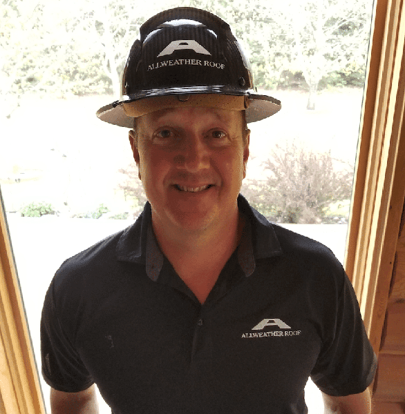 Allweather Roof foreman Vince Neumann shows off his custom made Pro Foreman hard hat as a symbol of achievement.