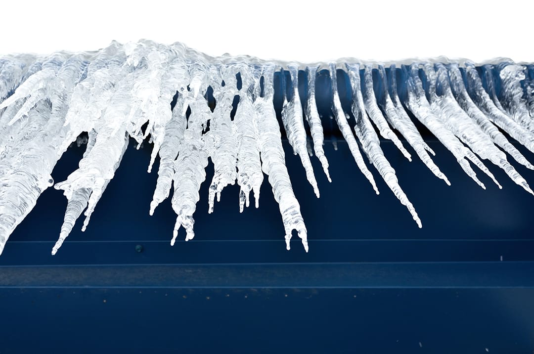 Large icycles on the roof of modern warehouse building