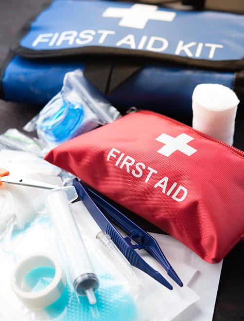 First aid medical kit on wood background,copy space