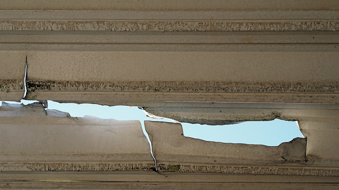 Damaged roof membrane