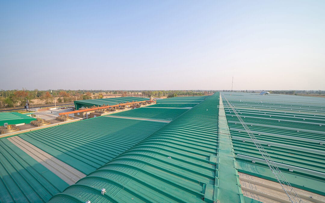 Empty space of metal sheet corrugated roof on rooftop of industry factory. Steel structure of modern station building roof. Metal. architecture design background. Commercial Metal Roof